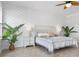 Bedroom featuring coastal decor, a quilt with sea patterns, shiplap accent walls, and neutral colors at 305 Lineback Pl. # 33, Longs, SC 29568