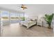Bright bedroom with a sliding glass door to a balcony overlooking the marsh at 305 Lineback Pl. # 33, Longs, SC 29568