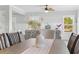 Dining area with stylish seating overlooking a vase and an open-concept flow into the living areas at 305 Lineback Pl. # 33, Longs, SC 29568