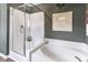 Elegant bathroom featuring a separate tub, shower with glass door, and modern fixtures at 324 Mayflower Dr., Calabash, NC 28467