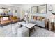 Comfortable living room featuring stylish decor and an open floor plan; ideal for entertaining at 324 Mayflower Dr., Calabash, NC 28467