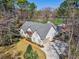 Beautiful aerial view of a well-maintained home with lush landscaping and a long driveway at 356 Savannah Dr., Pawleys Island, SC 29585