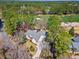 Stunning aerial view of home on golf course with mature trees and lush landscaping at 356 Savannah Dr., Pawleys Island, SC 29585