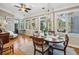 Charming breakfast nook with hardwood floors, a round table, and a view of the backyard at 356 Savannah Dr., Pawleys Island, SC 29585