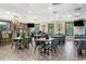 Elegant dining area with modern tables and chairs, perfect for entertaining guests at 356 Savannah Dr., Pawleys Island, SC 29585
