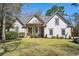 Charming exterior of a well-maintained home with manicured lawn and landscaping at 356 Savannah Dr., Pawleys Island, SC 29585