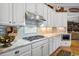 Stylish kitchen featuring custom cabinetry, stainless steel appliances, and granite countertops at 356 Savannah Dr., Pawleys Island, SC 29585