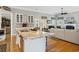 Open concept kitchen featuring a large island, stainless steel appliances, and seamless access to the living room at 356 Savannah Dr., Pawleys Island, SC 29585