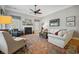 Cozy living room features a fireplace, hardwood floors, and comfortable seating at 356 Savannah Dr., Pawleys Island, SC 29585