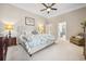 Spacious main bedroom with neutral walls, carpet, and access to an en-suite bathroom at 356 Savannah Dr., Pawleys Island, SC 29585