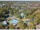 Overhead shot of wooded lot by pool, showcasing community amenities and landscape at 358 Salt Marsh Circle # 10-A, Pawleys Island, SC 29585