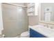 Bathroom includes a shower with sliding glass doors, towels, vanity, and toilet at 358 Salt Marsh Circle # 10-A, Pawleys Island, SC 29585