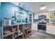 Updated kitchen with stainless steel appliances and custom shelving at 358 Salt Marsh Circle # 10-A, Pawleys Island, SC 29585