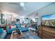 Comfortable living room with modern decor, and staircase access to upper level at 358 Salt Marsh Circle # 10-A, Pawleys Island, SC 29585