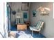 Enclosed front porch with comfortable seating and coastal decor at 358 Salt Marsh Circle # 10-A, Pawleys Island, SC 29585