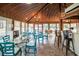 Spacious recreation room with wood paneled ceiling, tiled flooring and pond views at 358 Salt Marsh Circle # 10-A, Pawleys Island, SC 29585