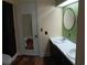 Bathroom features a double sink vanity, updated decor, and a tiled shower at 360 South Green Sea Rd., Loris, SC 29569