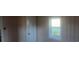 Bedroom with a window, closet and neutral-colored walls at 360 South Green Sea Rd., Loris, SC 29569
