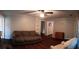 Spacious living room features a ceiling fan, wood-look floors, and neutral-colored walls at 360 South Green Sea Rd., Loris, SC 29569