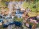 Aerial view of home with pond, shed, deck and mature trees at 3740 Limerick Rd., Myrtle Beach, SC 29579