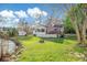 Charming home boasts a spacious backyard with a deck and fire pit, perfect for outdoor gatherings at 3740 Limerick Rd., Myrtle Beach, SC 29579