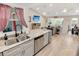 Stylish kitchen featuring stainless steel sink and a view to the living area at 3740 Limerick Rd., Myrtle Beach, SC 29579
