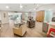 Bright, open-concept living room with vaulted ceilings and hardwood floors at 3740 Limerick Rd., Myrtle Beach, SC 29579