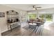 Cozy sunroom offering natural light and access to the outdoor deck at 3740 Limerick Rd., Myrtle Beach, SC 29579