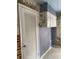 The hallway offers access to storage and is decorated with charming accents and wallpaper details at 3752 Tea Rose St. # 3752, Myrtle Beach, SC 29577