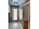 The hallway leads to an outdoor area and a bedroom, adorned with wallpaper for a unique touch at 3752 Tea Rose St. # 3752, Myrtle Beach, SC 29577