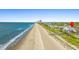 Aerial view showing the beach access and proximity to the ocean and attractions at 3806 North Ocean Blvd., Myrtle Beach, SC 29577