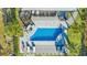 Aerial view of stunning pool area and patio with lush landscaping, perfect for outdoor entertainment at 3806 North Ocean Blvd., Myrtle Beach, SC 29577
