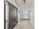 Welcoming foyer with modern lighting, sleek tile flooring, and an ocean view beyond at 3806 North Ocean Blvd., Myrtle Beach, SC 29577