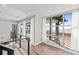 Bright living area featuring wide windows and sliding glass doors with ocean views at 3806 North Ocean Blvd., Myrtle Beach, SC 29577