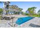 Resort-style pool area with outdoor seating and lush landscaping perfect for relaxation and entertainment at 3806 North Ocean Blvd., Myrtle Beach, SC 29577