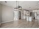 Spacious dining room overlooking kitchen area with hardwood floors at 4222 Congressional Dr., Myrtle Beach, SC 29579