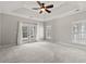 Spacious main bedroom featuring lots of light, ceiling fan, and patio access at 4222 Congressional Dr., Myrtle Beach, SC 29579