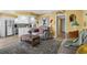 Bright living room offering an open-concept design with a seamless transition to the kitchen, perfect for modern living at 4234 Pinehurst Circle # L1, Little River, SC 29566