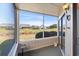 Relaxing screened porch provides a seamless transition to the outdoors at 4234 Pinehurst Circle # L1, Little River, SC 29566