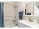 Bathroom with a shower-tub combo, vanity with a sink and mirror at 4305 S Ocean Blvd. # 301, North Myrtle Beach, SC 29582