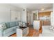 Relaxing living room with bright cabinets, kitchen view and comfortable decor at 4305 S Ocean Blvd. # 301, North Myrtle Beach, SC 29582