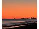 Scenic ocean view during sunset with city in the distance at 4305 S Ocean Blvd. # 301, North Myrtle Beach, SC 29582