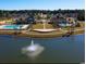 Aerial view of the community pond and surrounding neighborhood at 4437 Marshwood Dr., Myrtle Beach, SC 29579