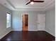 Spacious primary bedroom with a tray ceiling, ample natural light, and an en-suite bathroom at 4437 Marshwood Dr., Myrtle Beach, SC 29579