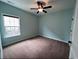 Bedroom with soft, neutral carpeting, and a ceiling fan; a comfortable and adaptable space at 4437 Marshwood Dr., Myrtle Beach, SC 29579