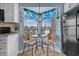 Breakfast nook featuring a cozy table, charming window with views, and an abundance of natural light at 4500 S Ocean Blvd. # 9-B, North Myrtle Beach, SC 29582