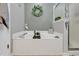 Bright bathroom features a large soaking tub and glass enclosed shower at 4652 Lightkeepers Way # 38-C, Little River, SC 29566