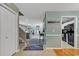 Inviting home entryway with coastal decor and hardwood flooring flowing into the kitchen at 4652 Lightkeepers Way # 38-C, Little River, SC 29566