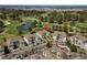 Aerial view of the condo complex, highlighting its proximity to the golf course and ponds at 4709 Wild Iris Dr. # 305, Myrtle Beach, SC 29577