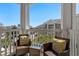 Relaxing balcony with comfortable seating and views of the surrounding community at 4709 Wild Iris Dr. # 305, Myrtle Beach, SC 29577